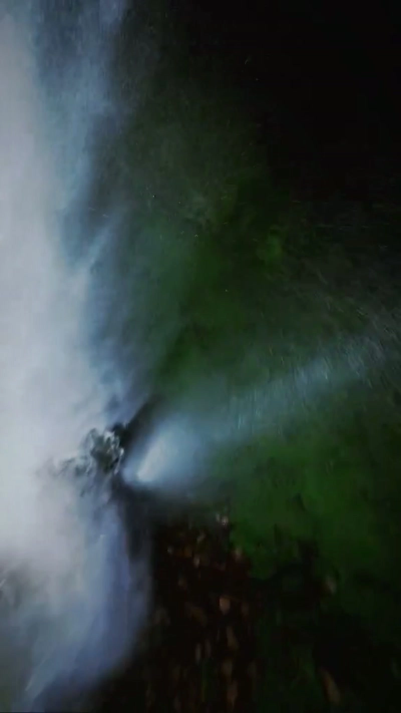First-person view flying through waterfalls